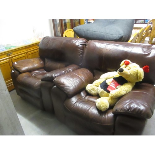 73 - Pair of Brown Leather Manual Rocking Chairs