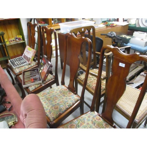 77 - Four Mahogany Dining Chairs with Shaped Splat and on Cabriole Legs