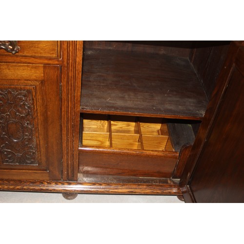 70 - Medium Stained Oak Edwardian Dresser on Eight Bun Feet having Three Carved Drawers Topping a Single ... 