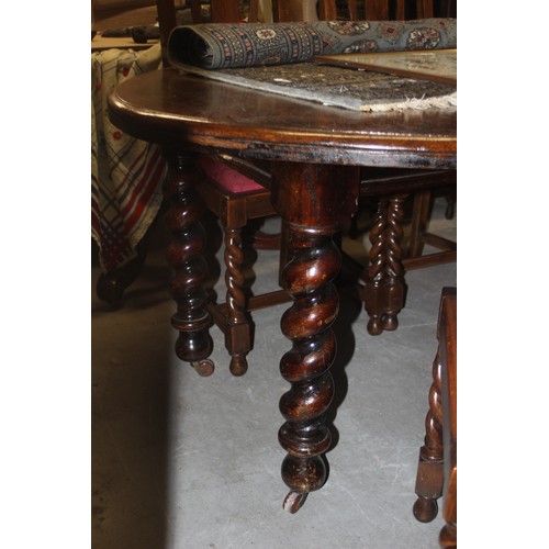 216 - Dark Oak Oval Dining Table on Chunky Spiral Legs and on Casters (59