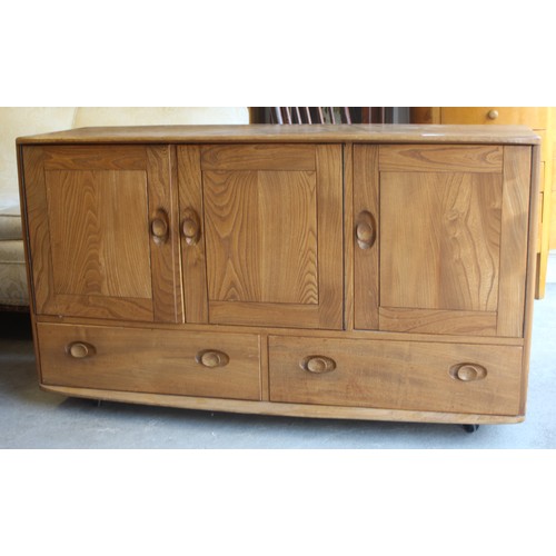 175 - Mid Century Modern Ercol Windsor Golden Oak Sideboard/Cabinet have three cupboards over two drawers ... 