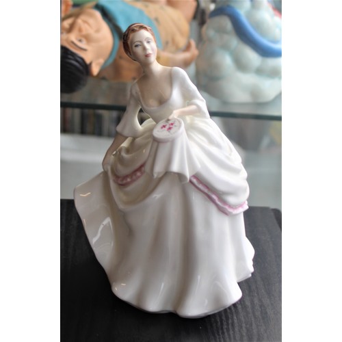 226 - A Royal Doulton Porcelain Figurine 