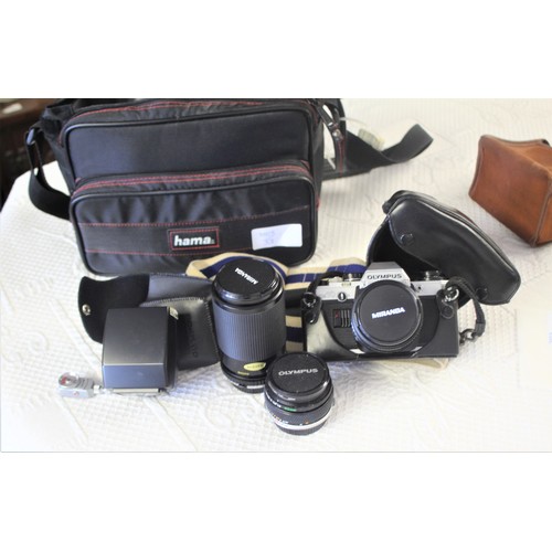 142 - Olympus OM10 35MM SLR Camera with Two Miranda Lenses and an Olympus Flashgun and Tripod - all in a S... 