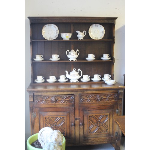 21 - Oak Dresser having Ornate Carved Front Detail (Two Drawers over Two Cupboards) - approx 50