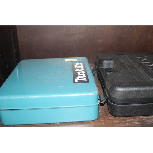 A Makita 6012HD Cordless Power Drill Plus a Black &