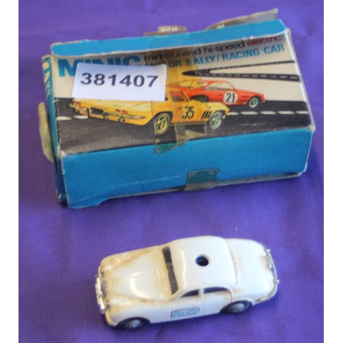 215 - Boxed Tri-ang Minic  M/1552  3.8 Litre Police Jaguar 
(Blue Flashing Light missing