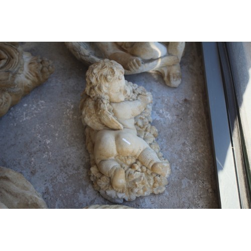 101 - Cast Figure of a Bacchus Cherub (Small Cherub lying on Bed of Grapes)