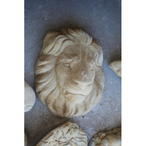 104 - Cast Plaque of a Lion's Face