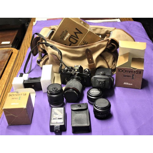 153 - Nikon Camera and Accessories (in a Large Nikon Shoulder Bag)