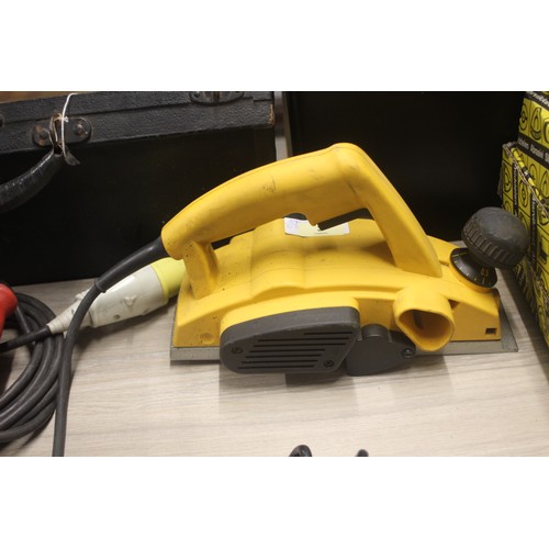 3 - A Dewalt PA6-G30 2mm Planer in Yellow with a 110 Volt Transformer for Site Work