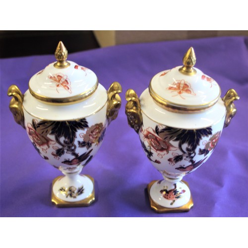 225 - A Pair of Lidded Coalport Vases (Hong Kong Pattern)