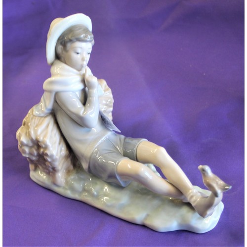 223 - Lladro Porcelain Figure Boy Reclining on a Bale of Hay