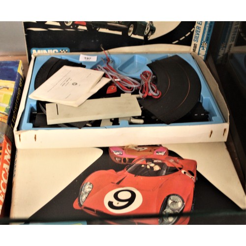 190 - Two Boxed Minic Racing Car Sets : one of a circular pack and one of a figure of eight configuration ... 