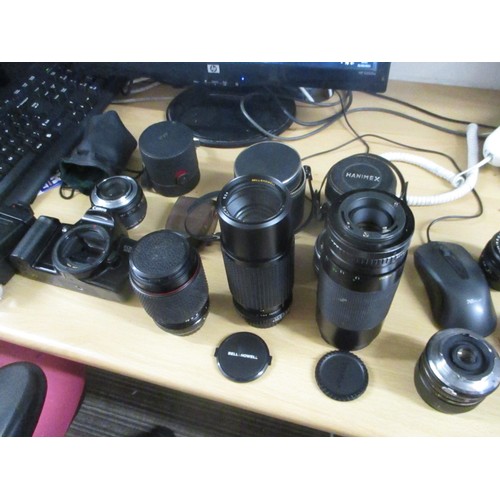 229 - Canon EOS 500 35mm SLR Camera, Lenses including a Teknina 70-210 zoom lens, Bell & Howell 80-205mm Z... 