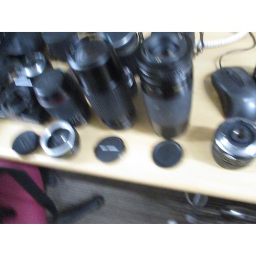 229 - Canon EOS 500 35mm SLR Camera, Lenses including a Teknina 70-210 zoom lens, Bell & Howell 80-205mm Z... 