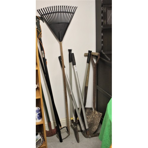 104 - Assorted Garden Tools:  Hoes, Pruner, Clippers, Rakes, Spades