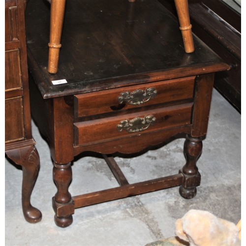 30 - A Large Over-Varnished Pine Occasional Table having Two Drawers