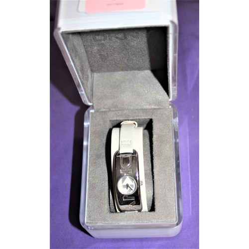 35 - BNIB Ladies' DKNY Wrist Watch with a Cream Broad Strap