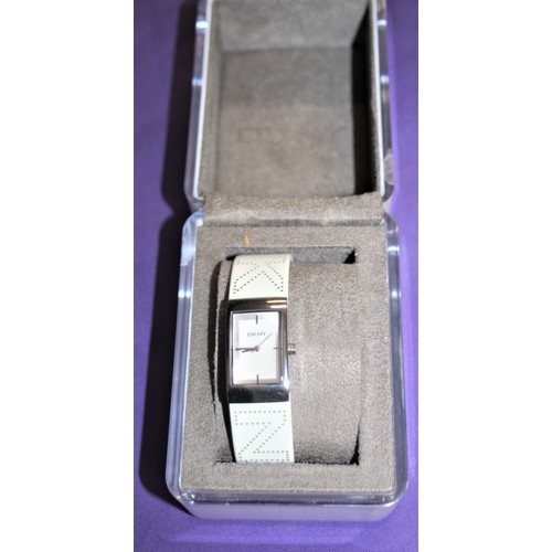 42 - BNIB Ladies' DKNY Wrist Watch with a White Strap