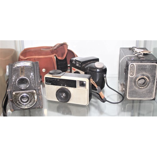 127 - Five Vintage Cameras: Kodak Box Brownie, Kodak Brownie 127, Instamatic 28, Ensign and a Kodak Browni... 