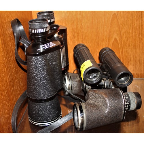 134 - Three Pairs of Binoculars