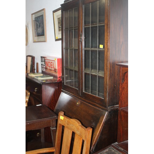 296 - Oak Bureau Bookcase having Two Drawers with Circular Metal Handles on Short Spiral Legs, with Two Gl... 