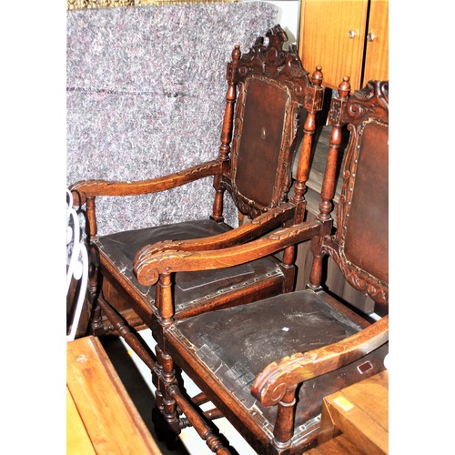 281 - Pair of Grand Ornately Carved Oak Carver Chairs having Leather Seats and Back Insets