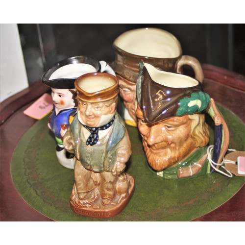 304 - Toby Jugs:  A Medium Size Doulton Robin Hood, another Medium Sized Doulton, a Crown Staffordshire, a... 