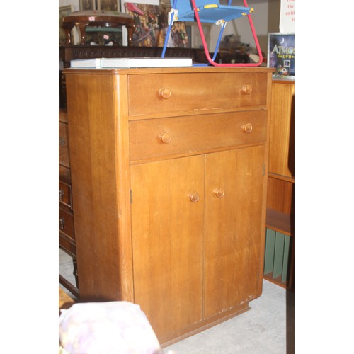 12 - A Mid-Century Oak and Plywood Tallboy having Two Wide Drawers over a Three-Shelf Cupboard - Some Ven... 