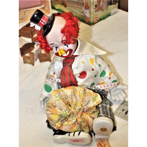 15 - Clown Doll with Porcelain Head, Ceramic Hands and Feet with a Cloth Body