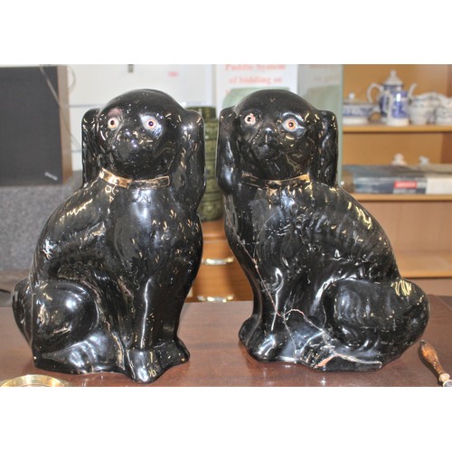 55 - A Pair of Staffordshire Pot Dogs
