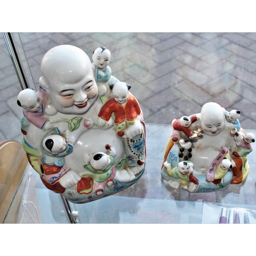 76 - Two Glazed Pottery Buddhas