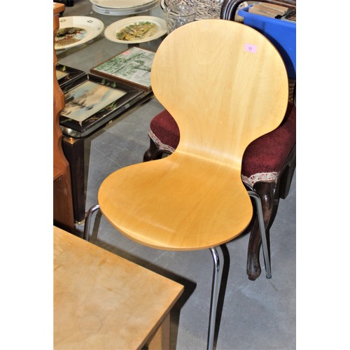 83 - A Contoured Bentwood Ply and Chromed Legged Chair of Retro Desiogn