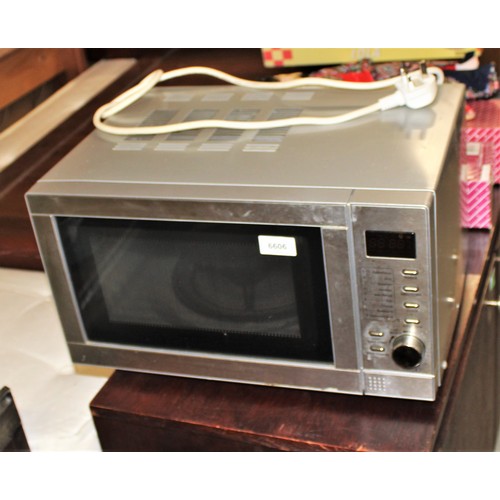 80 - Tesco Microwave Model MG208 800 Watt