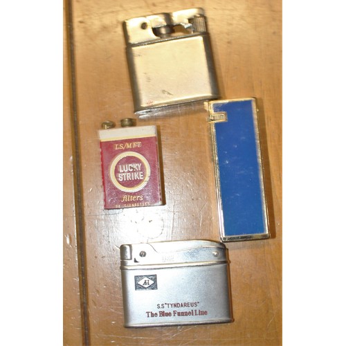 8 - Four Cigarette Lighters:  One Lucky Strike, One Ronson, One MyGlam, and a Noble Alfred Holt Blue Fun... 