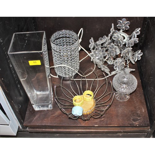 86 - A Table Lamp. a Perspex, Ceiling Light Fitting, a Tall Glass Vase, Glass Bon Bon Dish and a Wire Fru... 