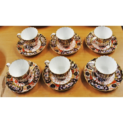 234 - Six Crown Derby Imari Pattern Cups and Saucers (Green motif)