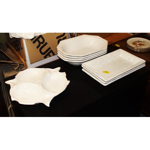 119 - Eight White Glazed Serving Dishes