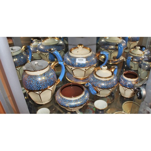 30 - Blue Lusterware: Two Graduated Teapots, One Hot Water Pot and Stand, Jug, and Sugar Bowl