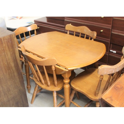 106 - Kitchen Table and Four Pine Spindle-back Chairs