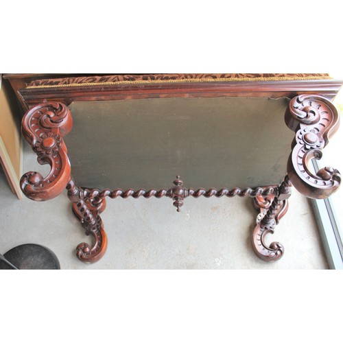 254 - An Ornately Carved Mahogany Footstool with Spiral Supporting Stretchers