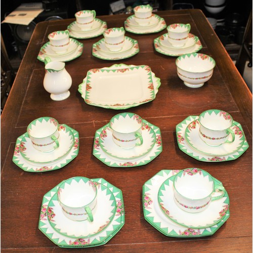 94 - Paragon Fine Bone China Ten-Place Setting Tea Set Plus extra Saucers and Cake Plates

these cannot b... 