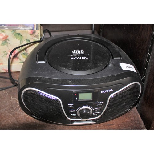 132 - A Roxel Radio/CD Player Plus a Box of CDs