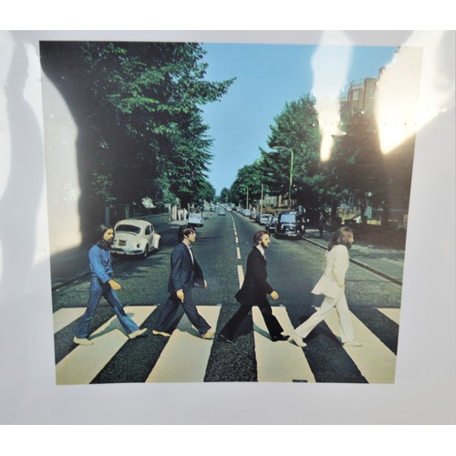 5 - Two Mounted Un-framed Beatles Prints 