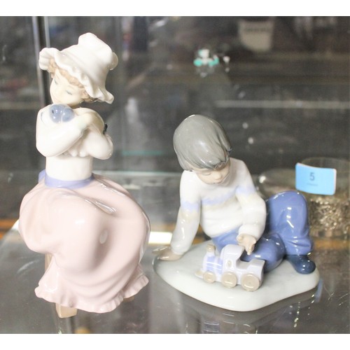 19 - Two Nao Figures - Girl with Puppy and Boy with Train