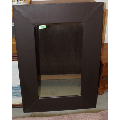 66 - Wall Mirror having a Faux Leather Frame