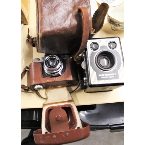 26 - Two Cameras:  a Halina Anastigmet 1:3:5 = 45mm Camera in Leather Case, Plus a Kodak Six-20 