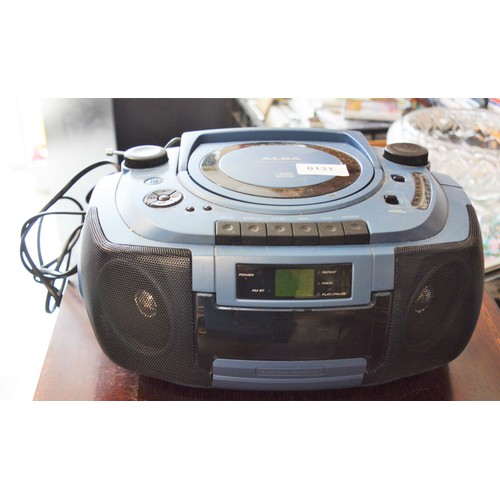 An ALBA Stereo CD, Radio and Cassette Player in Metallic Blue Colouway ...