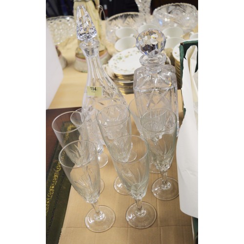 115 - Assorted Glass Items: Large quantity including  Two Decanters (with Stoppers), Plus Drinking Glasses