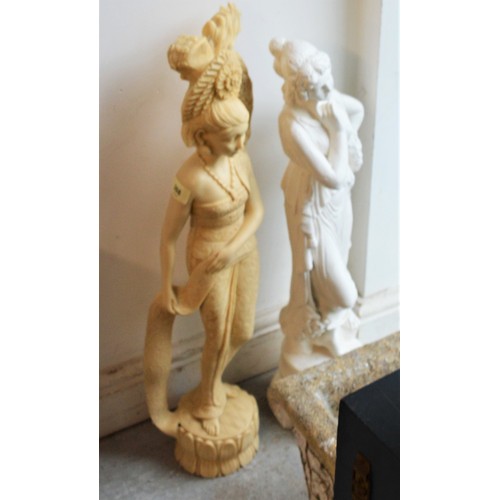 268 - Two Ornamental Figures : a Classical Plaster Moulding, and a resign Oriental Figure. Approx. 27 